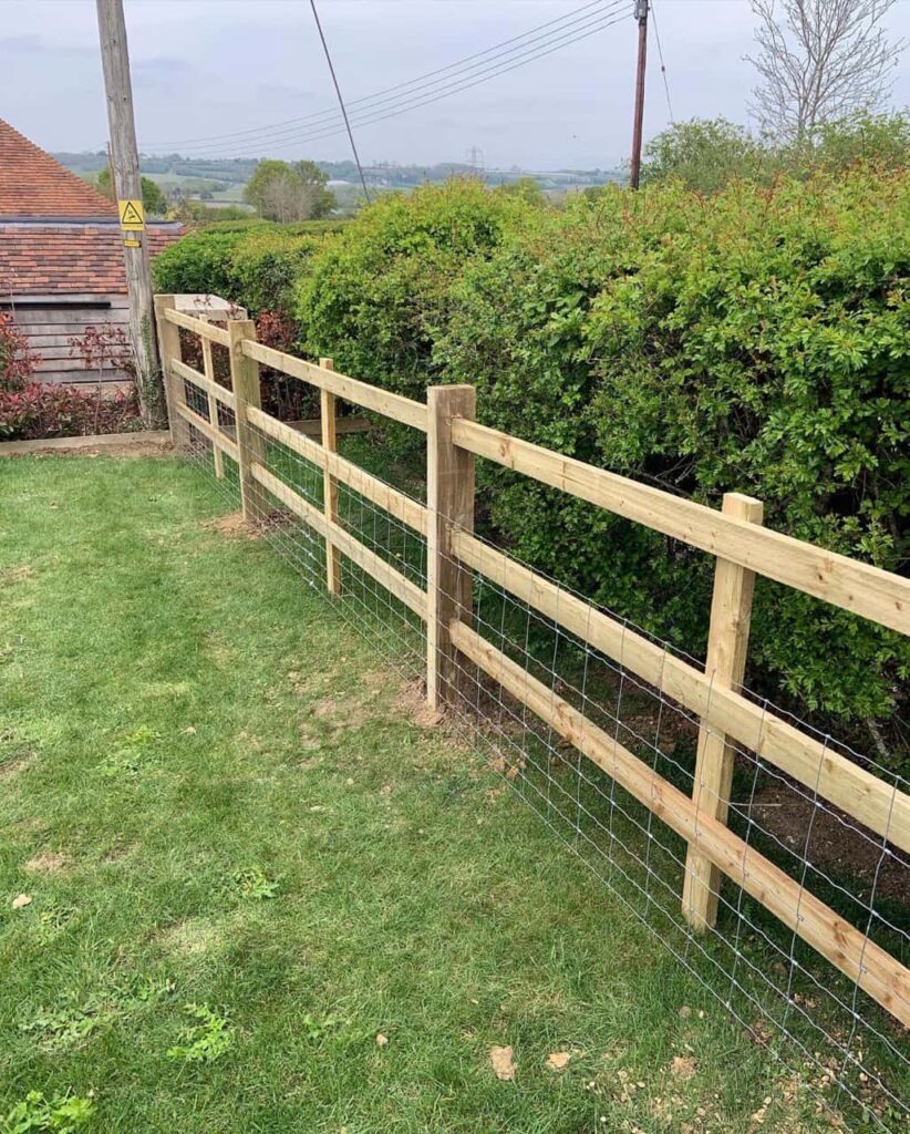 This is a photo of a picket fence and picket gate installed by Fast Fix Fencing Dersingham